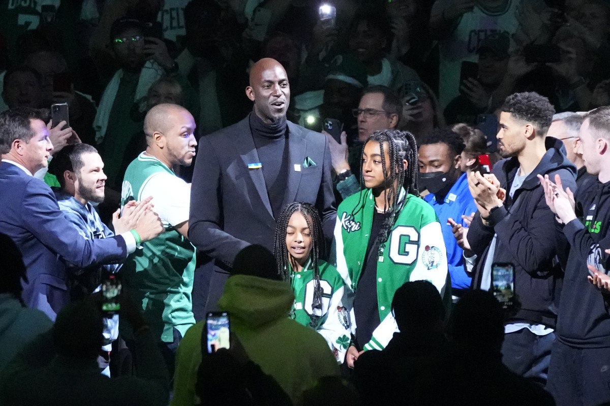 Basketball Hall of Fame and former Boston Celtic and Kevin Garnett is introduced and walks out onto the court with his daughter during his number retirement ceremony after game between the Boston Celtics and the Dallas Mavericks at TD Garden.